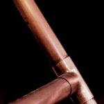 Photo by Magda Ehlers: https://www.pexels.com/photo/copper-pipes-on-black-background-3721272/